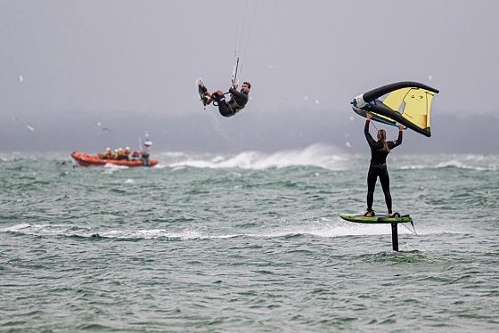 Olympic kitesurfer Ellie Aldridge wingfoiling in the Solent with kitesurfer Tom Court. Photo CWL/Martin Allen. 